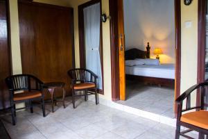 Postel nebo postele na pokoji v ubytování Putu Guest House