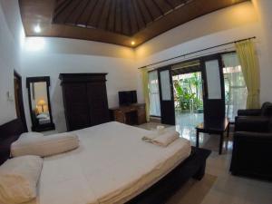 Gallery image of Putu Guest House in Canggu