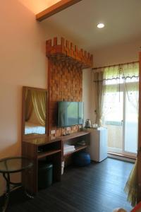 TV a/nebo společenská místnost v ubytování Mei Man Slide Homestay
