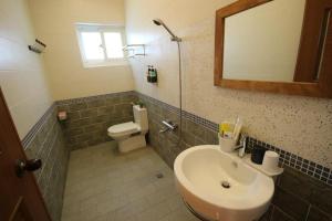 Koupelna v ubytování Mei Man Slide Homestay
