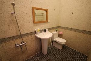 Koupelna v ubytování Mei Man Slide Homestay