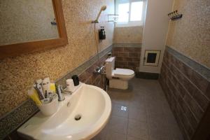 Koupelna v ubytování Mei Man Slide Homestay