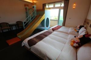 Postel nebo postele na pokoji v ubytování Mei Man Slide Homestay + 21 fotografií