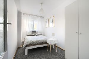 Lova arba lovos apgyvendinimo įstaigoje Chmielna Hammock Apartment