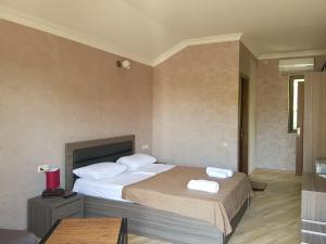 Ένα ή περισσότερα κρεβάτια σε δωμάτιο στο Hotel Chero