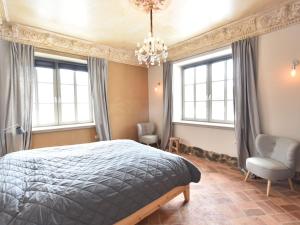 Un pat sau paturi într-o cameră la Modern Apartment in Detershagen with Private Terrace
