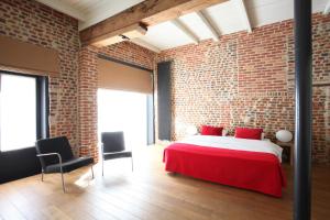 Letto o letti in una camera di Hotel The Lodge Heverlee