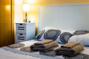 Ein Bett oder Betten in einem Zimmer der Unterkunft Hola Apartment Benidorm