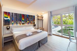 Postel nebo postele na pokoji v ubytování Atotxa Rooms