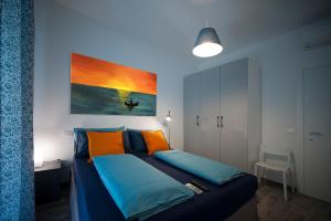Posteľ alebo postele v izbe v ubytovaní Cipriani 5 RivieraHoliday