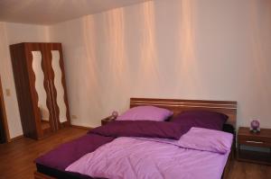 Postel nebo postele na pokoji v ubytování Gästezimmer Michelangelo