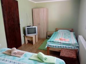 Ένα ή περισσότερα κρεβάτια σε δωμάτιο στο Rooms Violeta
