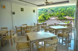 Restoran või mõni muu söögikoht majutusasutuses Lavella Villas Kuta Lombok