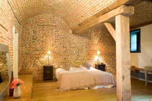 Letto o letti in una camera di Hotel The Lodge Heverlee
