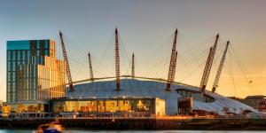 a stadium with a building in front of a city at simply guesthouse in London