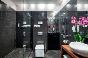 Kúpeľňa v ubytovaní Hotel Unicus Krakow Old Town - Destigo Hotels
