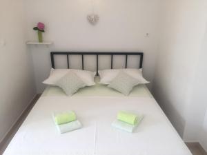 Postel nebo postele na pokoji v ubytování Adria Stobrec