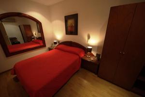 Postel nebo postele na pokoji v ubytování Sur Hotel