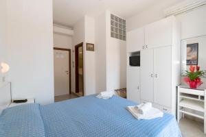 Letto o letti in una camera di Hotel Tre Assi