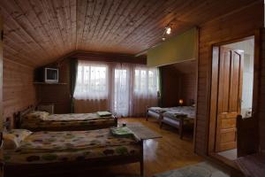 Postel nebo postele na pokoji v ubytování Pensiunea Moldovan