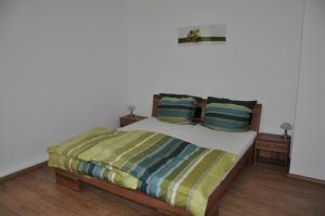 Postel nebo postele na pokoji v ubytování Gästezimmer Michelangelo