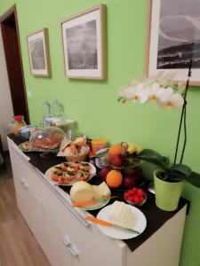 a kitchen counter with many plates of food on it at Bella Giulia in Ragusa