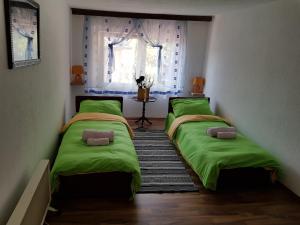 Postel nebo postele na pokoji v ubytování BTO Holiday Home