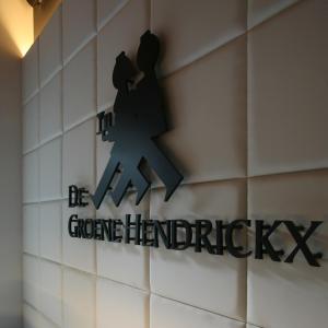 a sign on the wall of a gym at Hotel De Groene Hendrickx in Hasselt