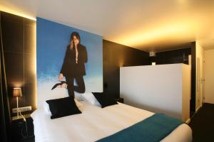 Ein Bett oder Betten in einem Zimmer der Unterkunft Hotel De Groene Hendrickx
