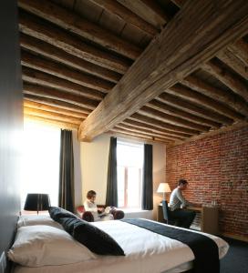 Krevet ili kreveti u jedinici u okviru objekta Hotel De Groene Hendrickx
