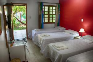 Cama ou camas em um quarto em Pousada Ipitanga IV