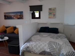 Postel nebo postele na pokoji v ubytování Loft La Tahonilla