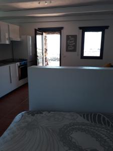 Kuchyň nebo kuchyňský kout v ubytování Loft La Tahonilla