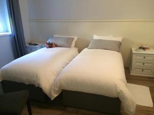 Posteľ alebo postele v izbe v ubytovaní Taverna del Puccini