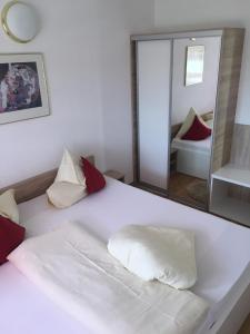 Postel nebo postele na pokoji v ubytování Appartements Antunovic