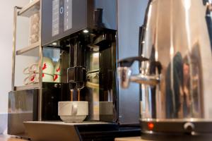 A kitchen or kitchenette at Hotel Mirabell