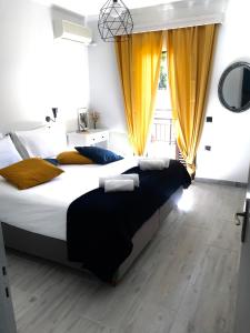 Postel nebo postele na pokoji v ubytování NIKOLETA'S CORFU APARTMENTS
