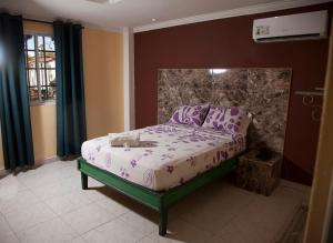Postel nebo postele na pokoji v ubytování Residencial Turistico Cuba