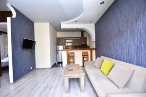 Een TV en/of entertainmentcenter bij Hotel Phaliashvili
