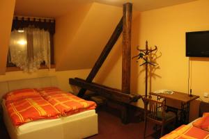 Letto o letti in una camera di Hotel Max Šimek