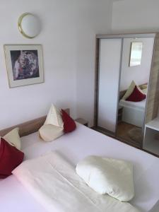 Postel nebo postele na pokoji v ubytování Appartements Antunovic