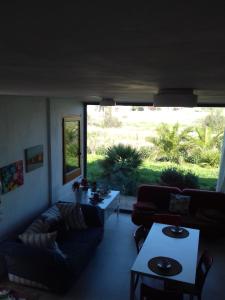 Posedenie v ubytovaní Casa dei Fenicotteri