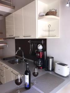 Kuchyňa alebo kuchynka v ubytovaní Villa Jani Top Floor Suite