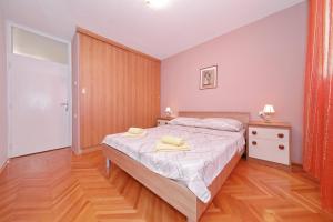 Postel nebo postele na pokoji v ubytování Apartman Lana in city centre with garage