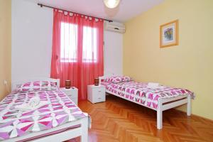Postel nebo postele na pokoji v ubytování Apartman Lana in city centre with garage