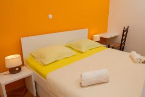 Кровать или кровати в номере Apartment Ina