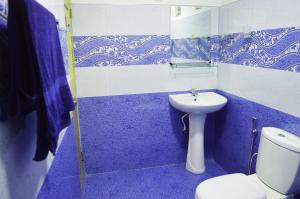 Koupelna v ubytování Subash Hotel