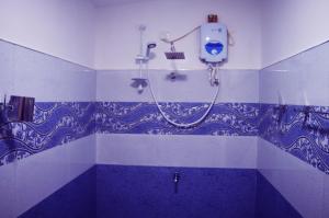 Koupelna v ubytování Subash Hotel
