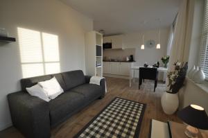 Posezení v ubytování Appartement Eigen Tijd