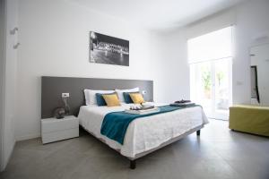 Säng eller sängar i ett rum på Suite Dreams in Verona